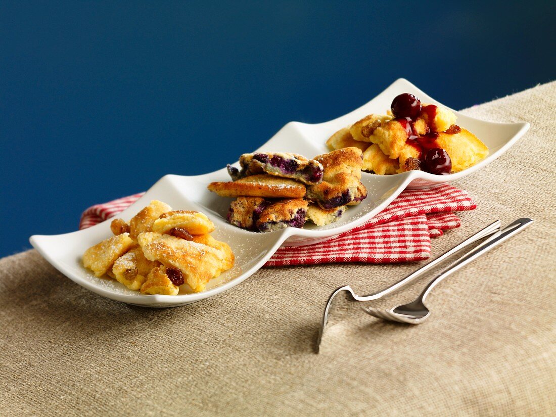 Kaiserschmarren (sweet cut up pancakes) served three different ways