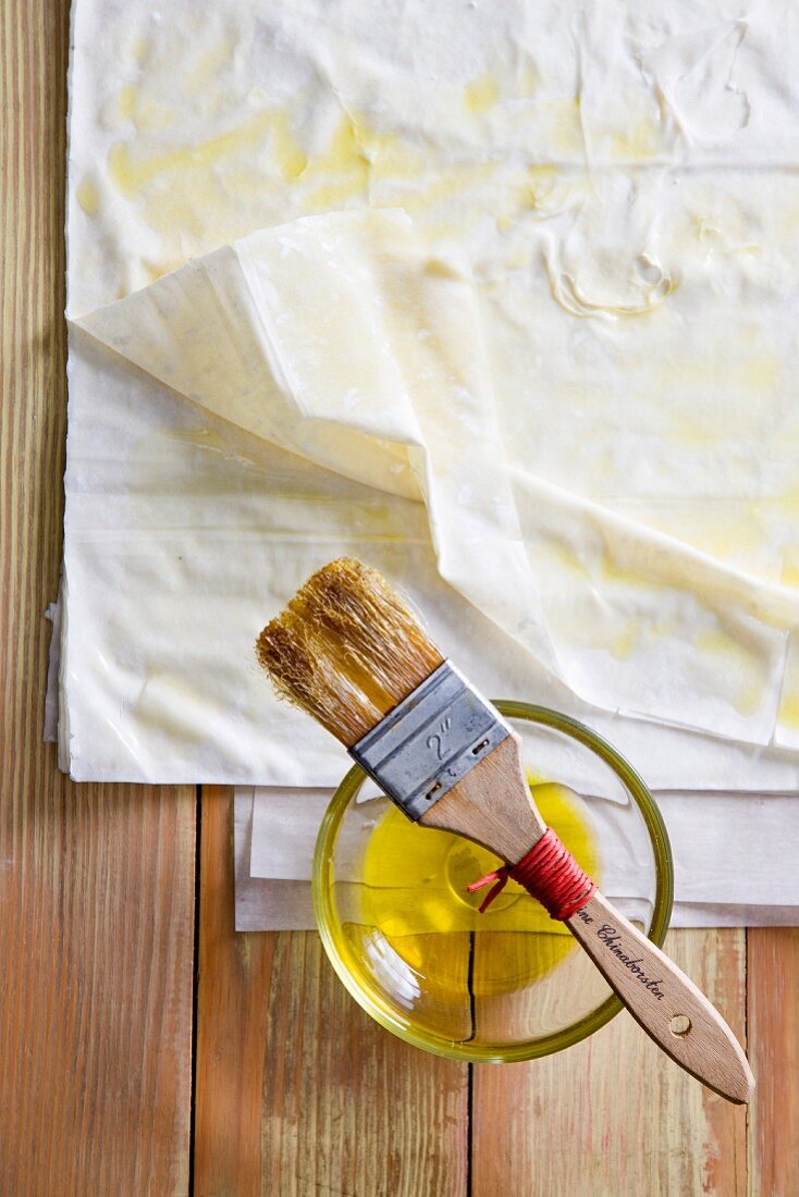 Brushing phyllo dough with butter