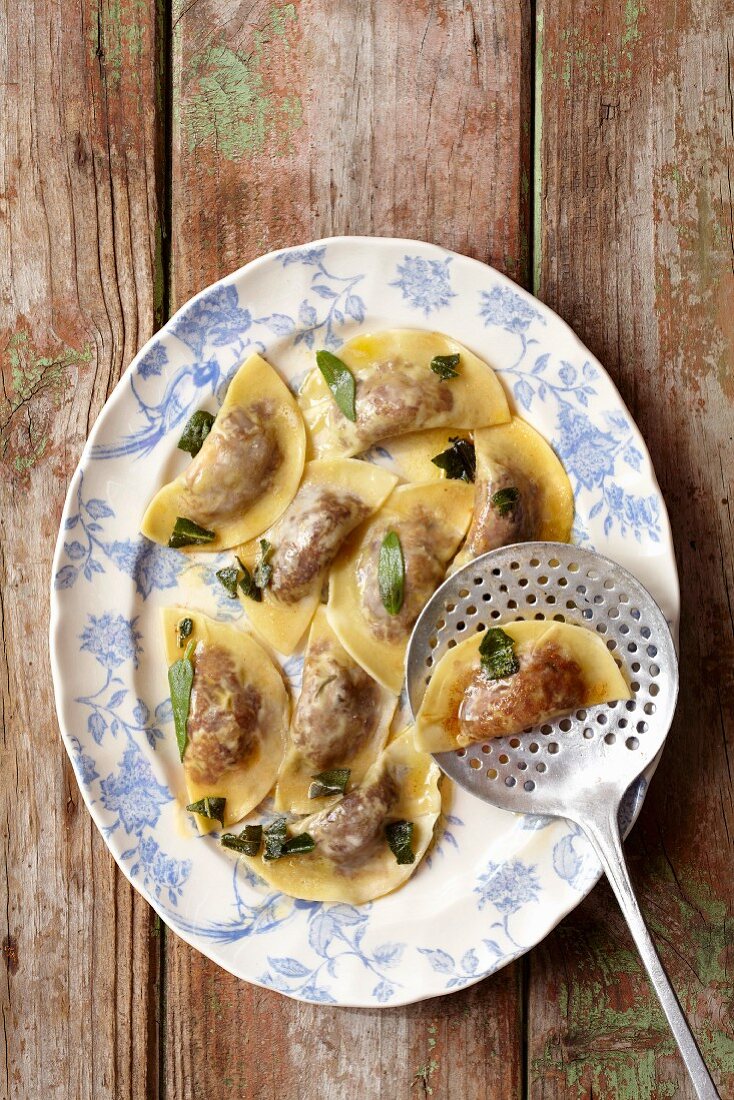 Fried agnolotti filled with lamb in a beurre noisette