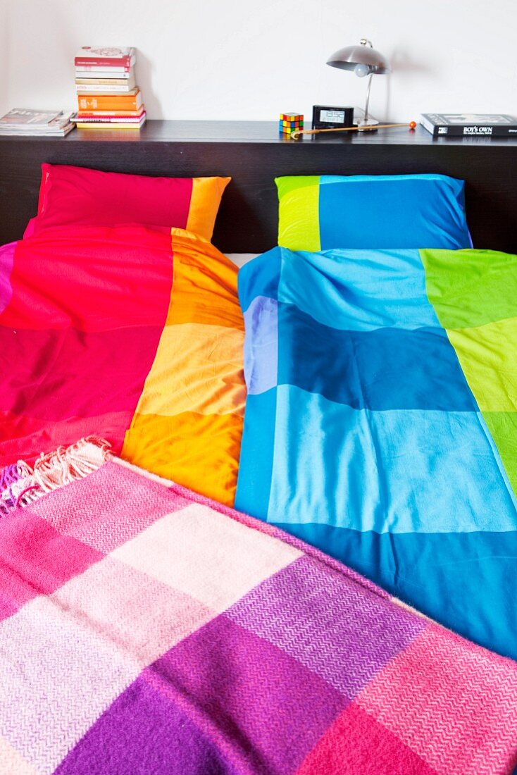 Colourful bed linen & checked wool blanket