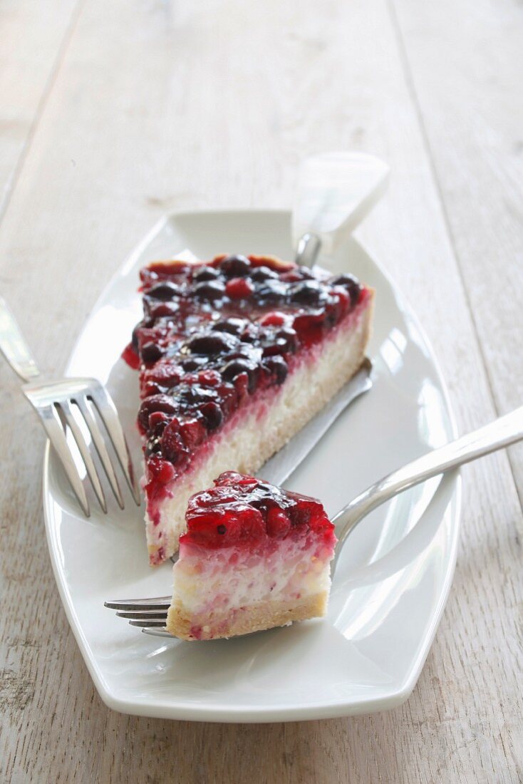 A piece of rice pudding cake with mixed berries