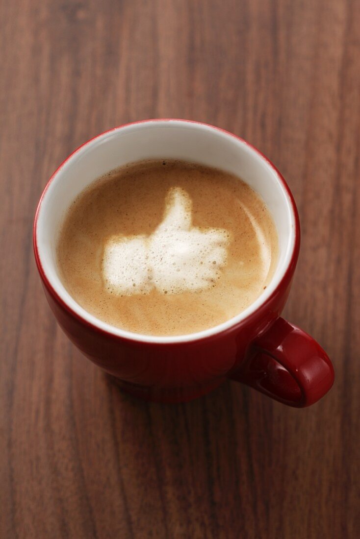 Capuccino with the 'Like' symbol