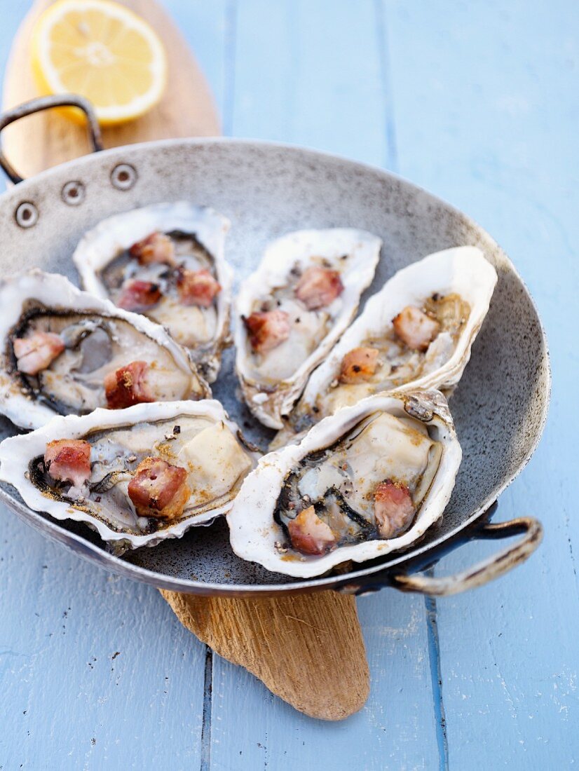 Oysters with cooked diced bacon