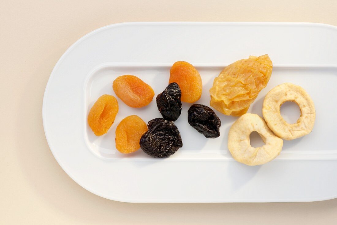 Dried fruit on a white porcelain plate