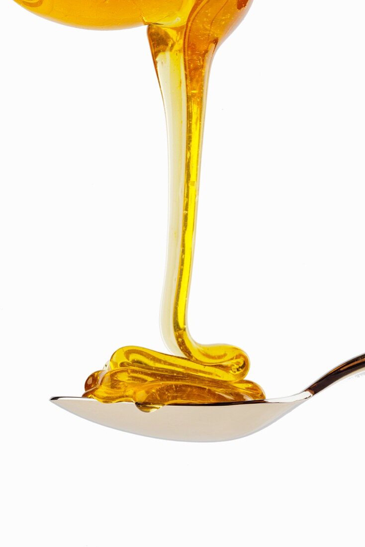 Spoon full of honey, close up