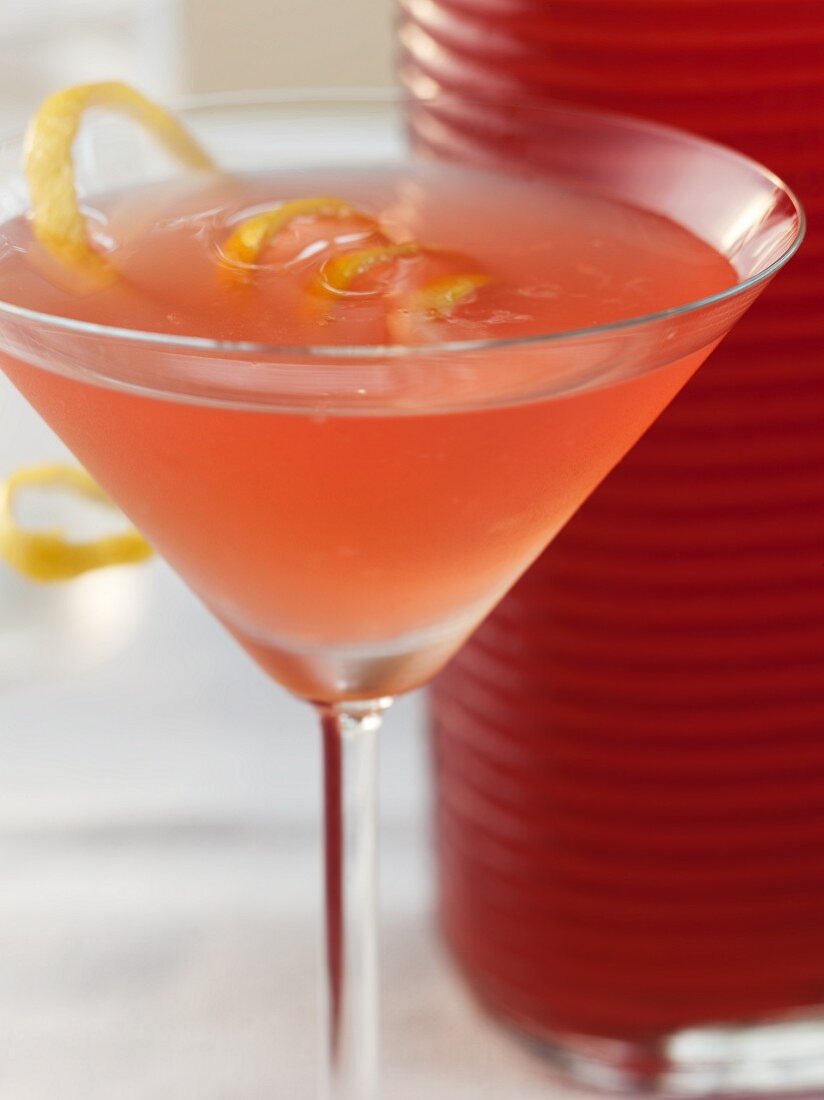 Elderflower Cocktail in a Martini Glass with Lemon Twist Garnish