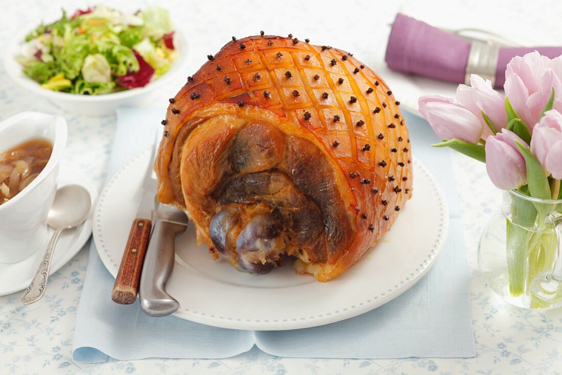 Roast ham on the bone, studded with cloves