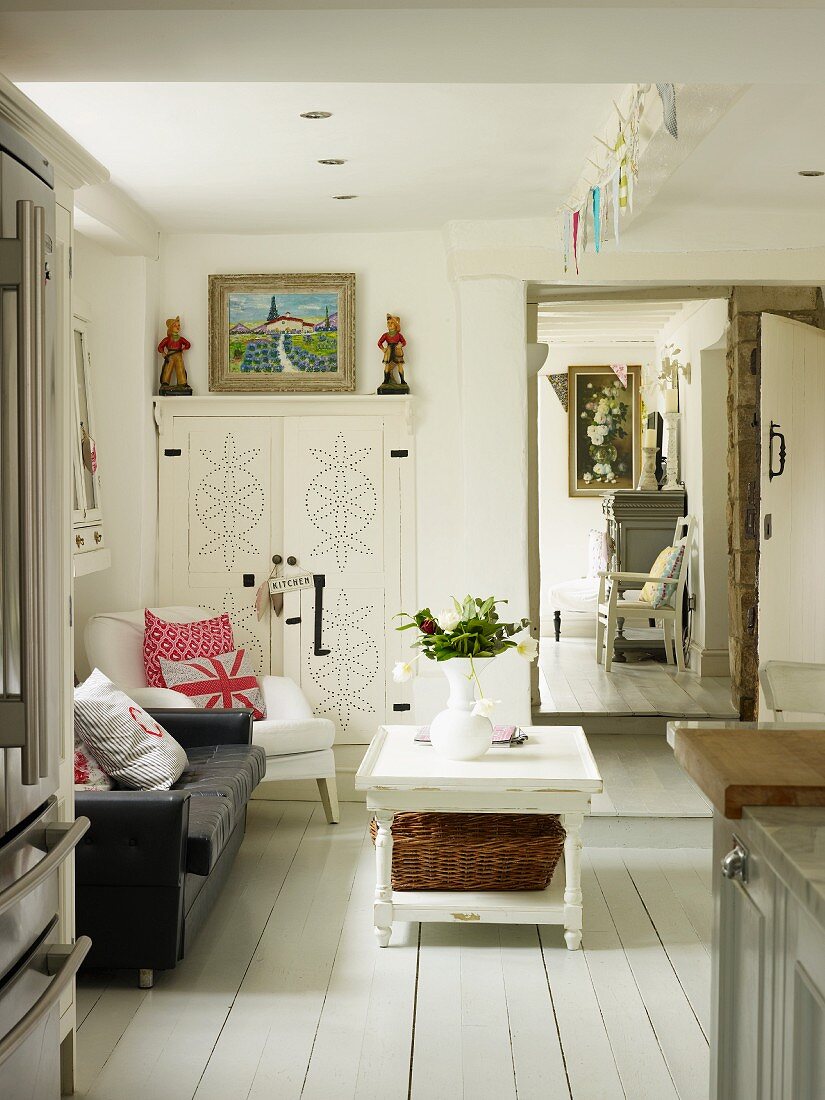 Seating area in spacious kitchen with view into living room