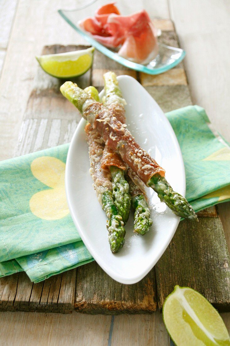 Asparagus tempura wrapped in prosciutto