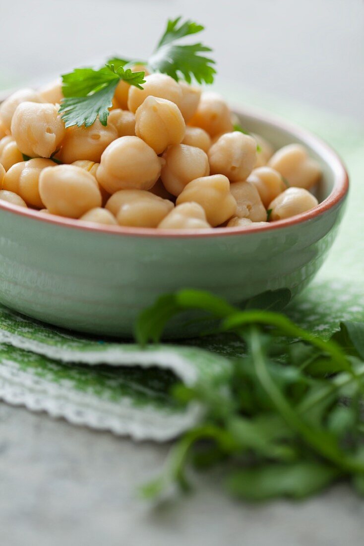 Chickpeas in a bowl with parsley