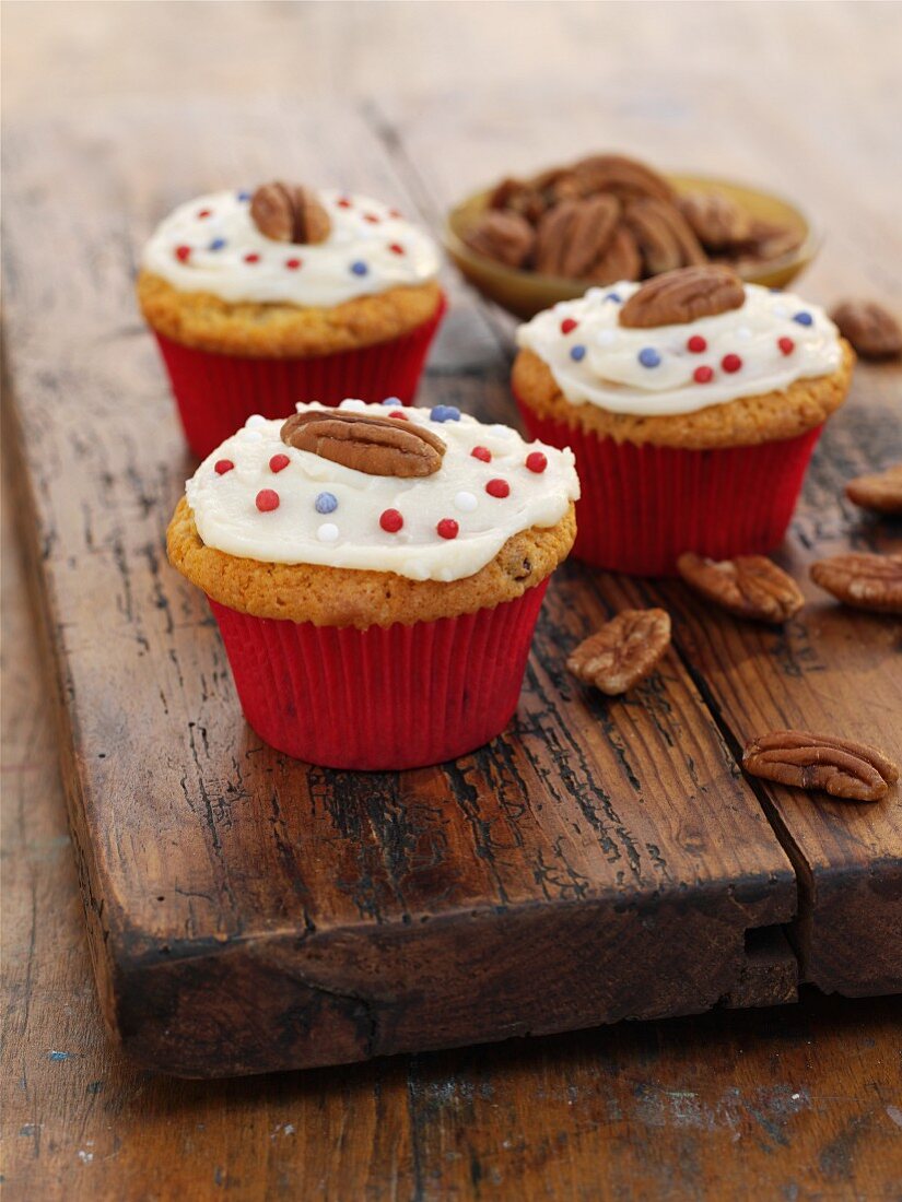 Pecan nut and ginger cupcakes with cranberries
