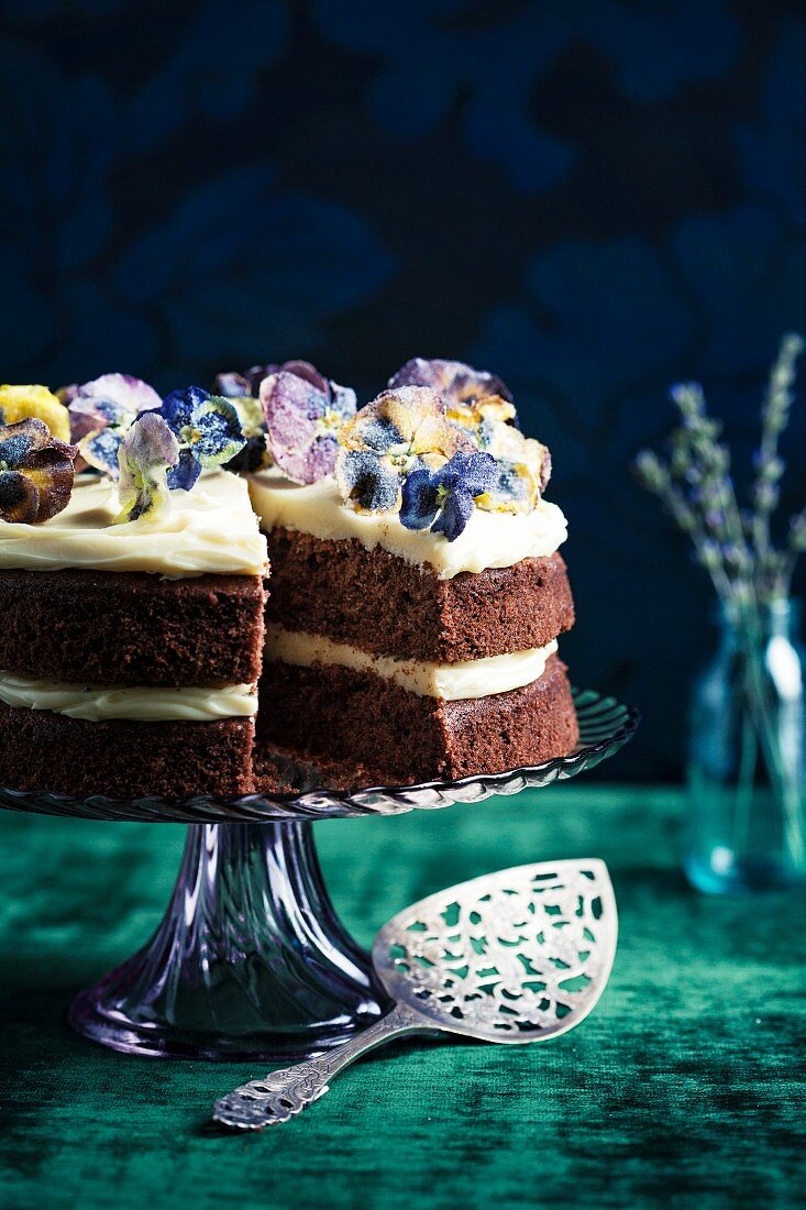 Chocolate and lavender layer cake with candied violets