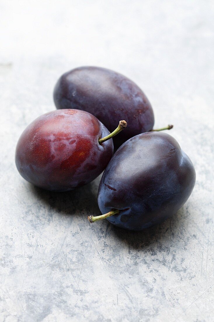 Three purple plums