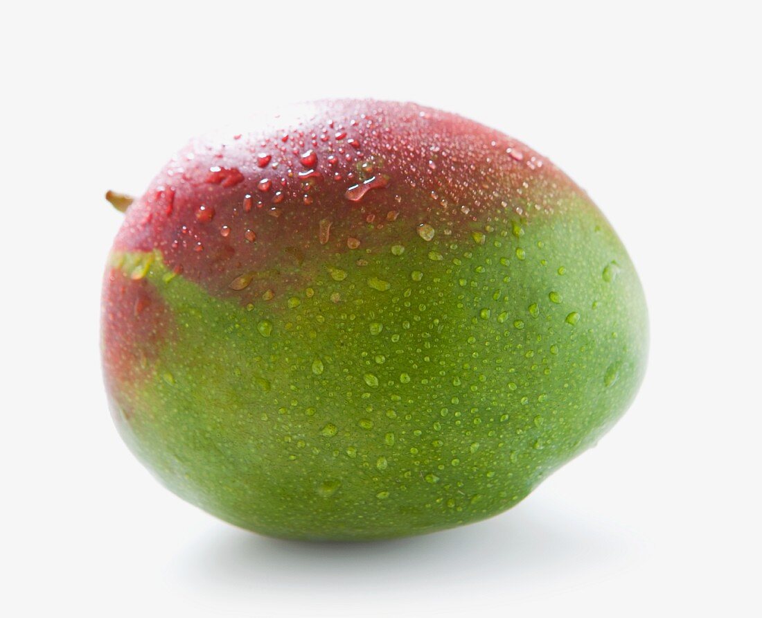 A mango with drops of water