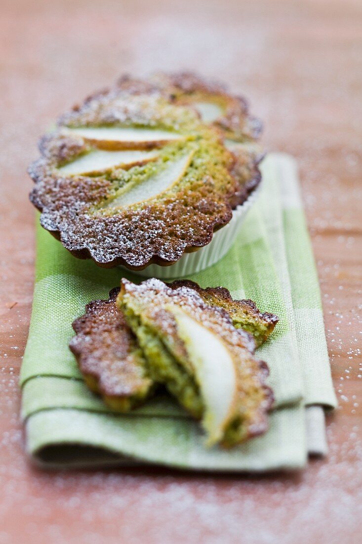Financier cakes with pears and pistachios