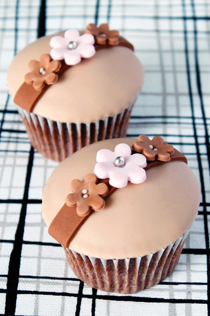 Chocolate cupcakes decorated with flowers