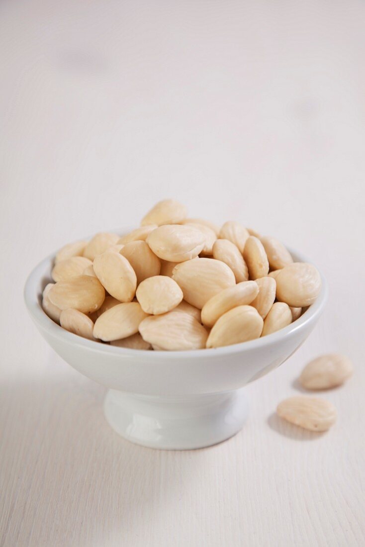 Almonds in a white bowl