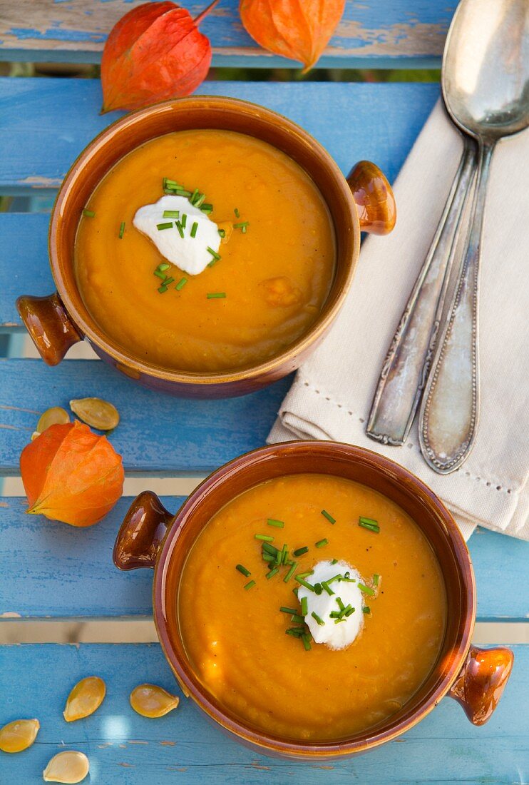 Pumpkin soup with chives and a blob of sour cream