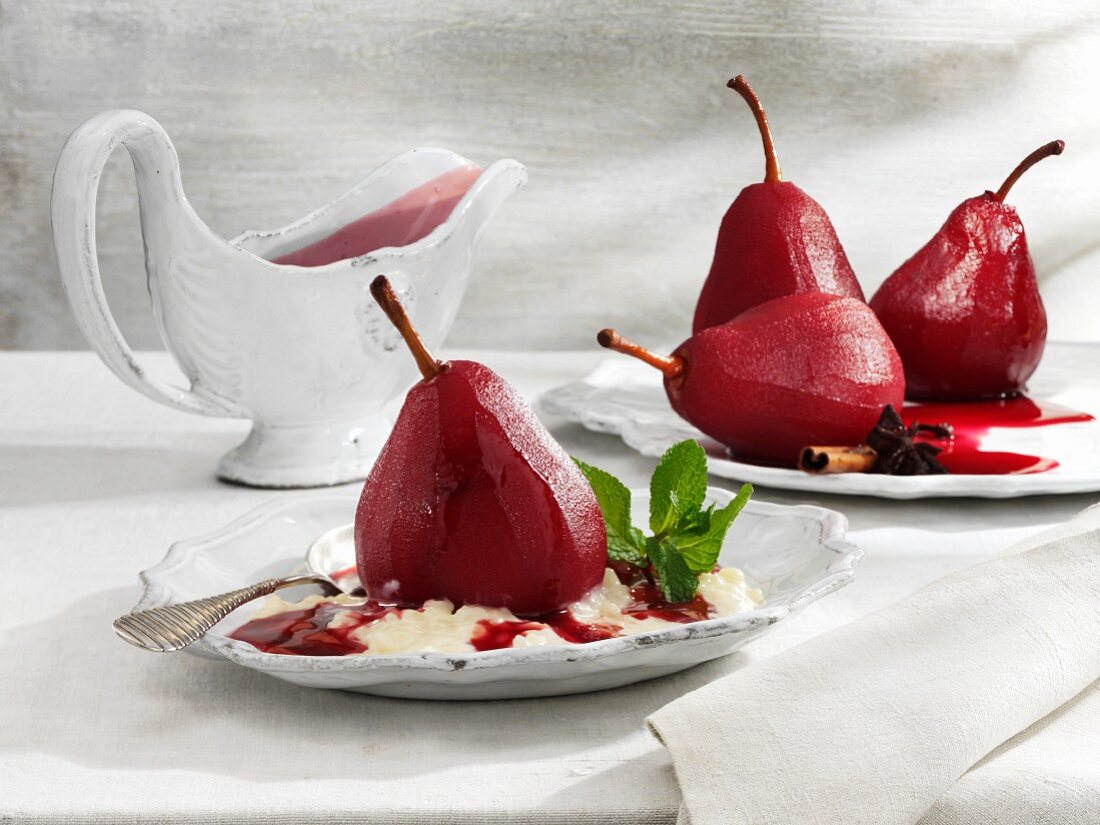 Red wine-poached pears on a bed of rice pudding