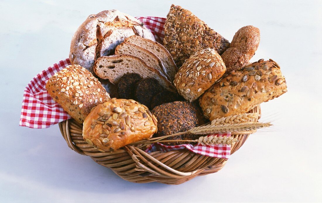 Wholemeal bread and rolls in a bread basket