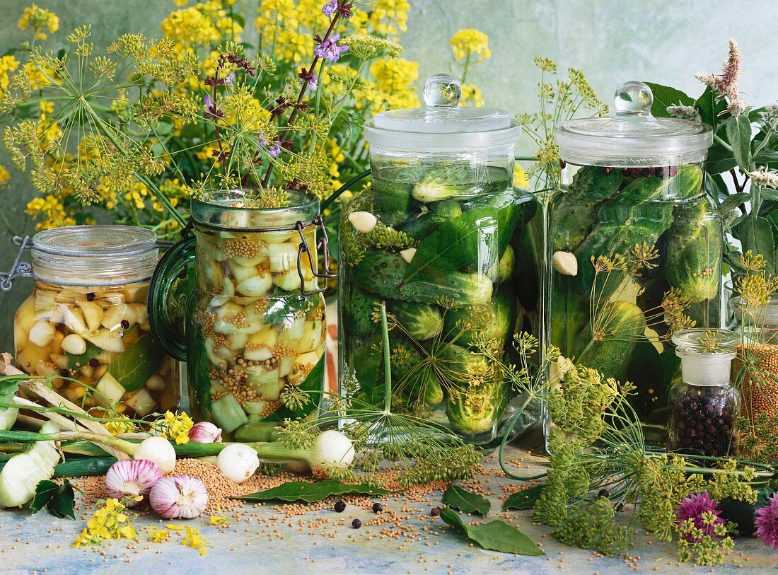 Four jars of pickled gherkins