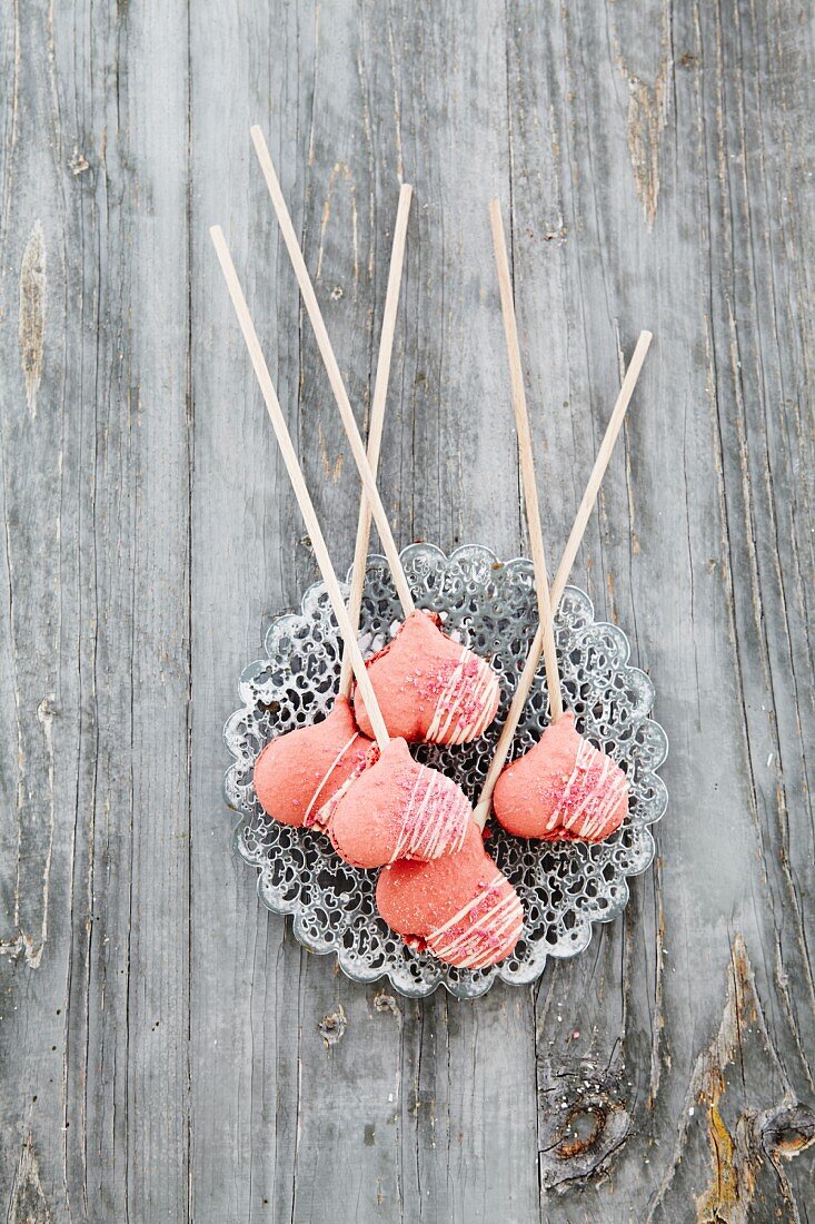 Heart-shaped biscuits on skewers