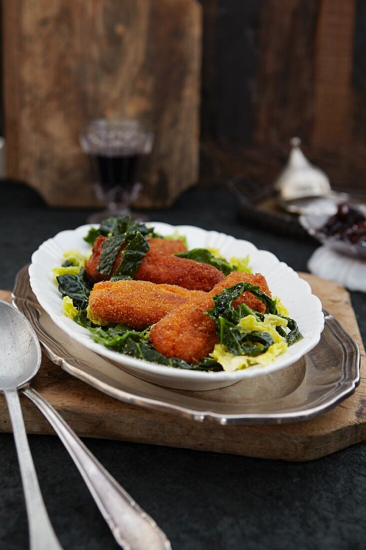 Breaded cod with shredded savoy cabbage