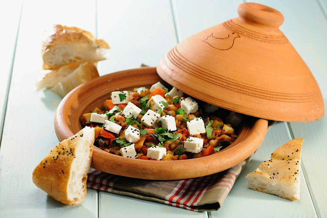 Vegetarian Tagine with chick peas and sheep s milk cheese, selective focus