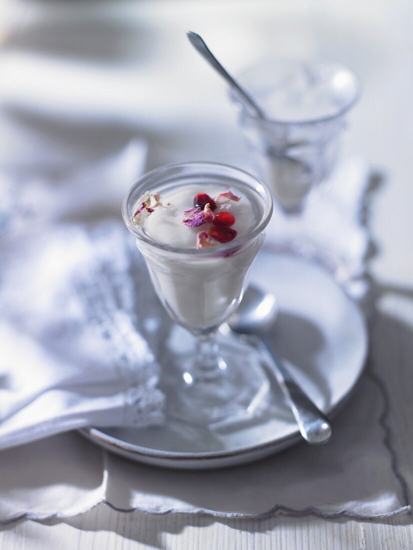 Creamy dessert with pomegranate seeds