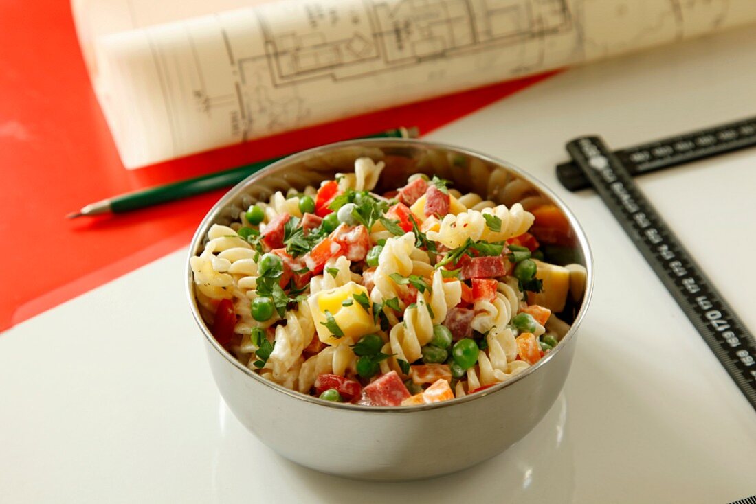 Pasta salad with cheese and salami