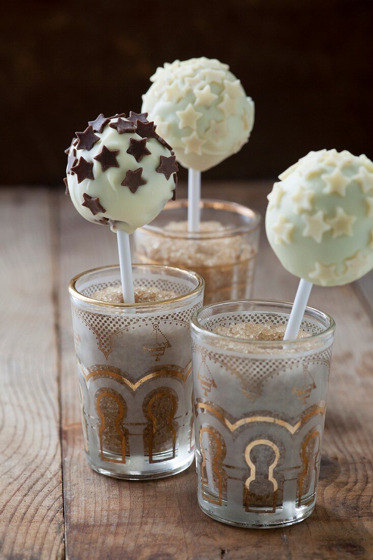 Cake pops with white chocolate icing and chocolate stars