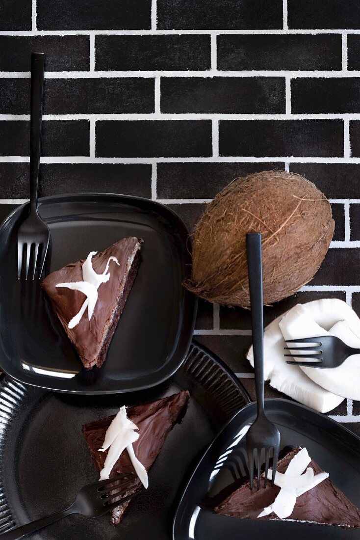 Brownie triangles with chocolate glaze and grated coconut