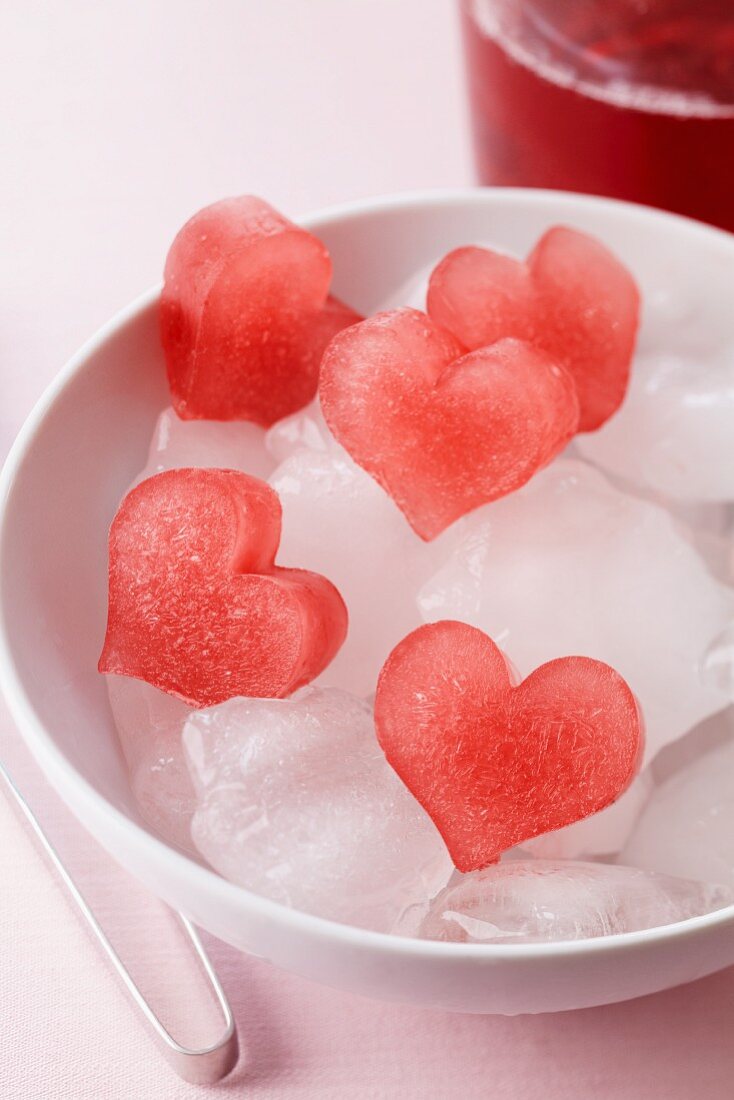 Red, heart-shaped ice cubes