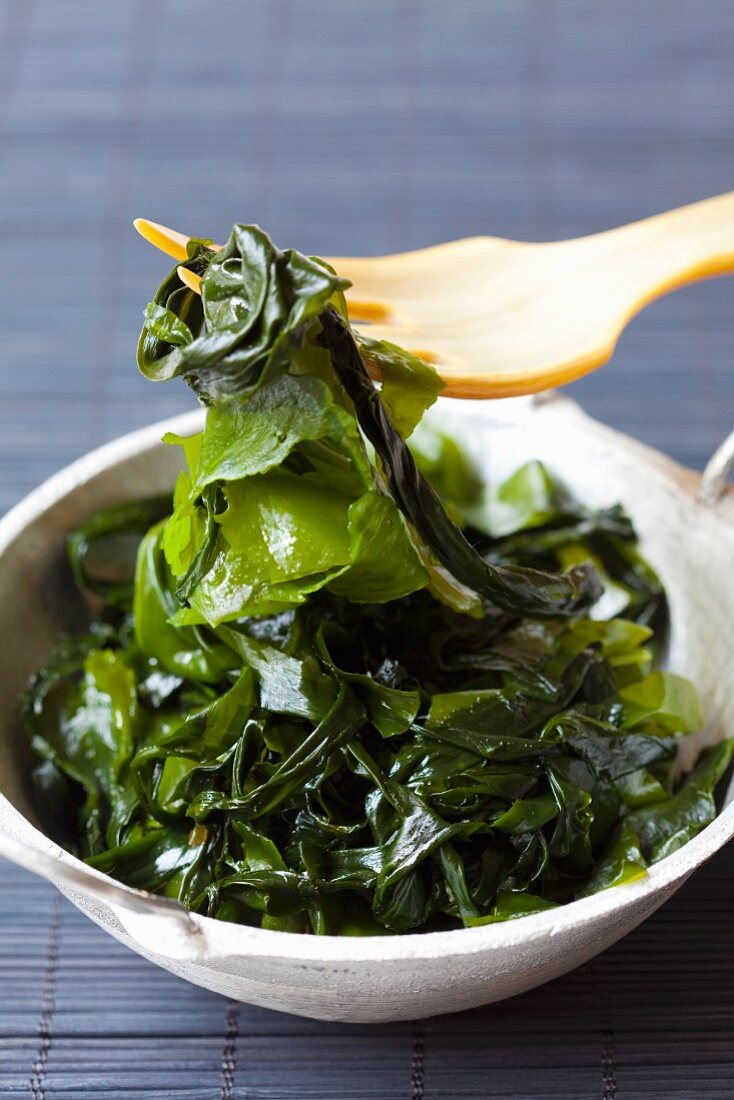 Wakame in a bowl with a fork