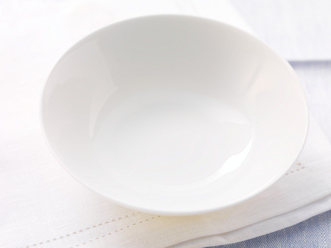 An empty soup bowl