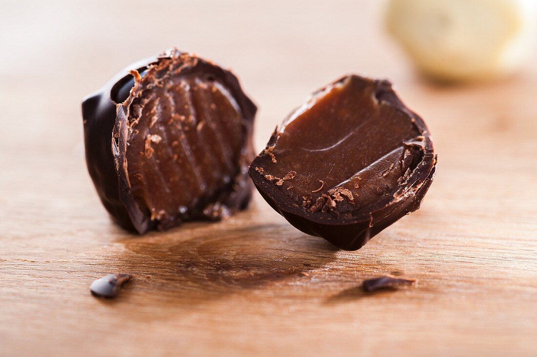 A home-made dark chocolate truffle, cut in half
