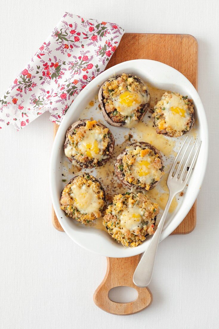 Stuffed mushrooms with bacon and quail's eggs