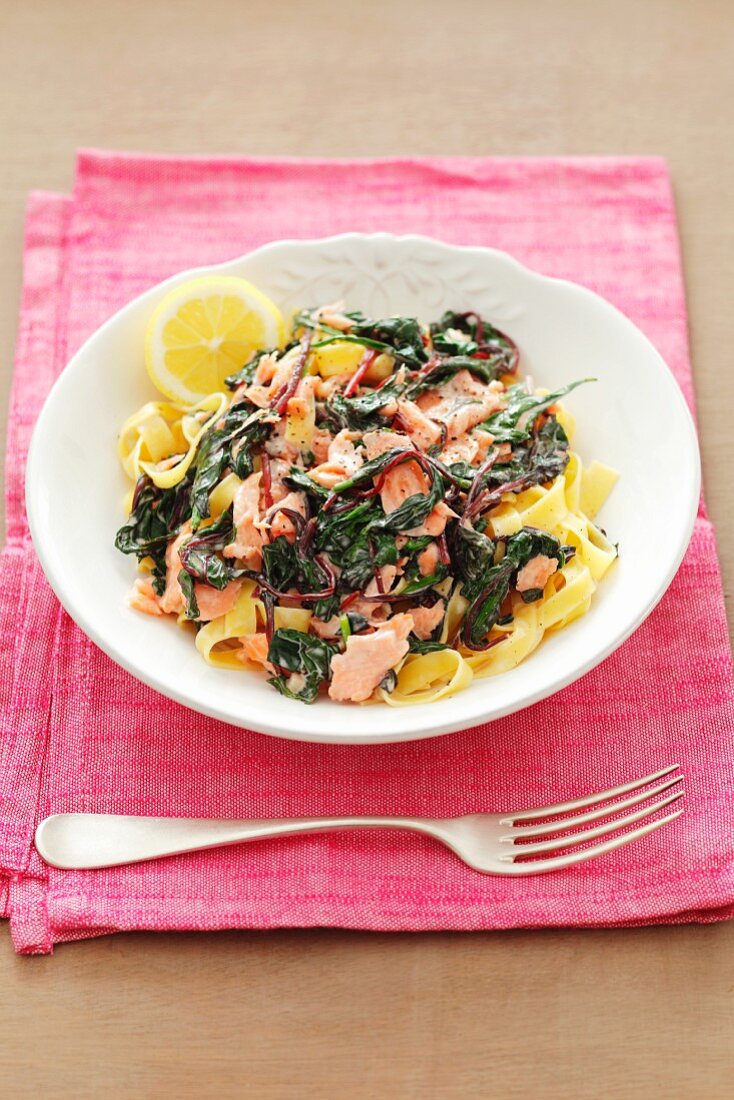 Ribbon pasta with spinach, beetroot leaves and salmon