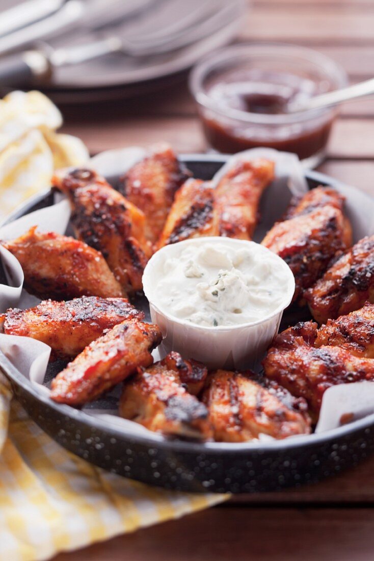 Grilled chicken wings with a dip