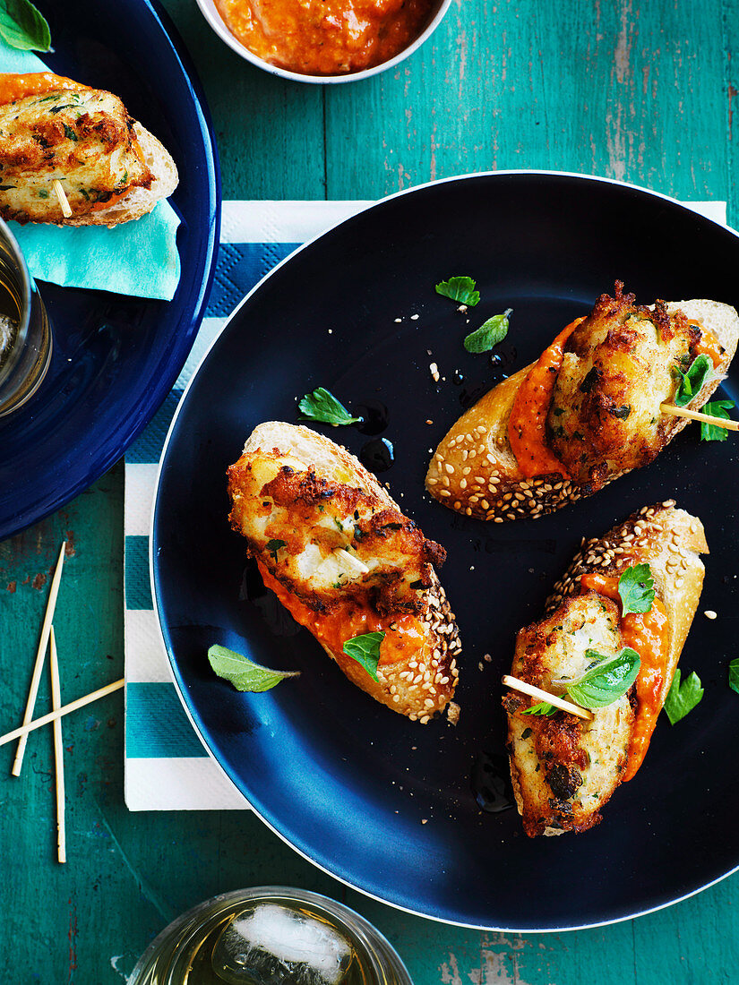 Grilled bread topped with dried salt cod and romesco sauce