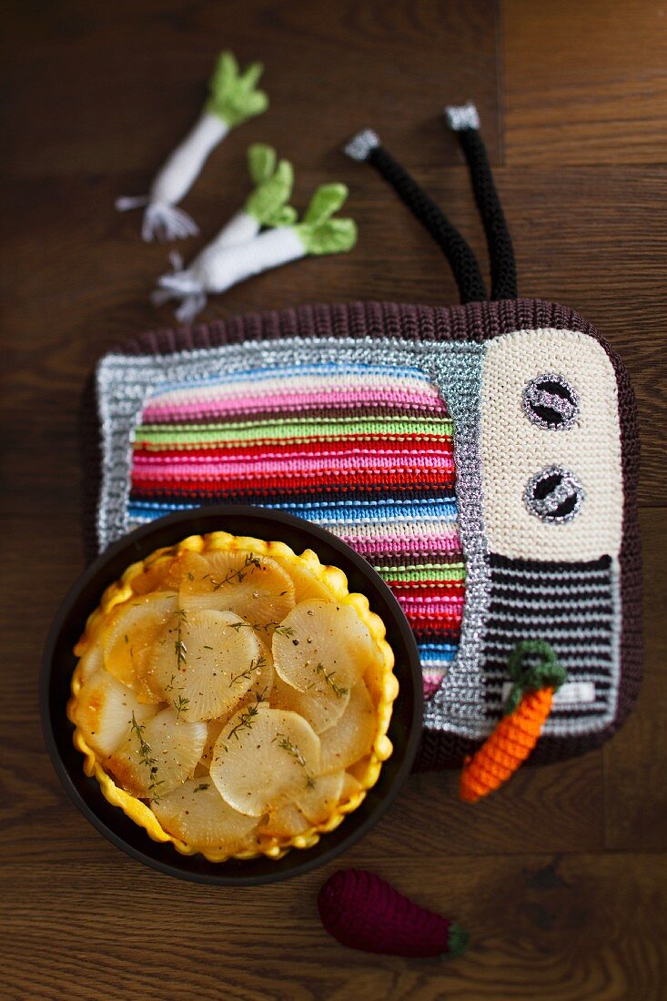 Turnip tarte tatin on a crocheted place mat