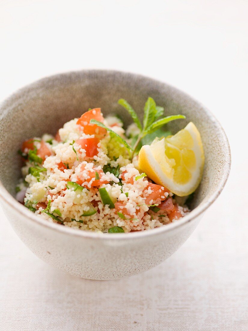 Couscous salad with tomatoes, cucumbers and mint
