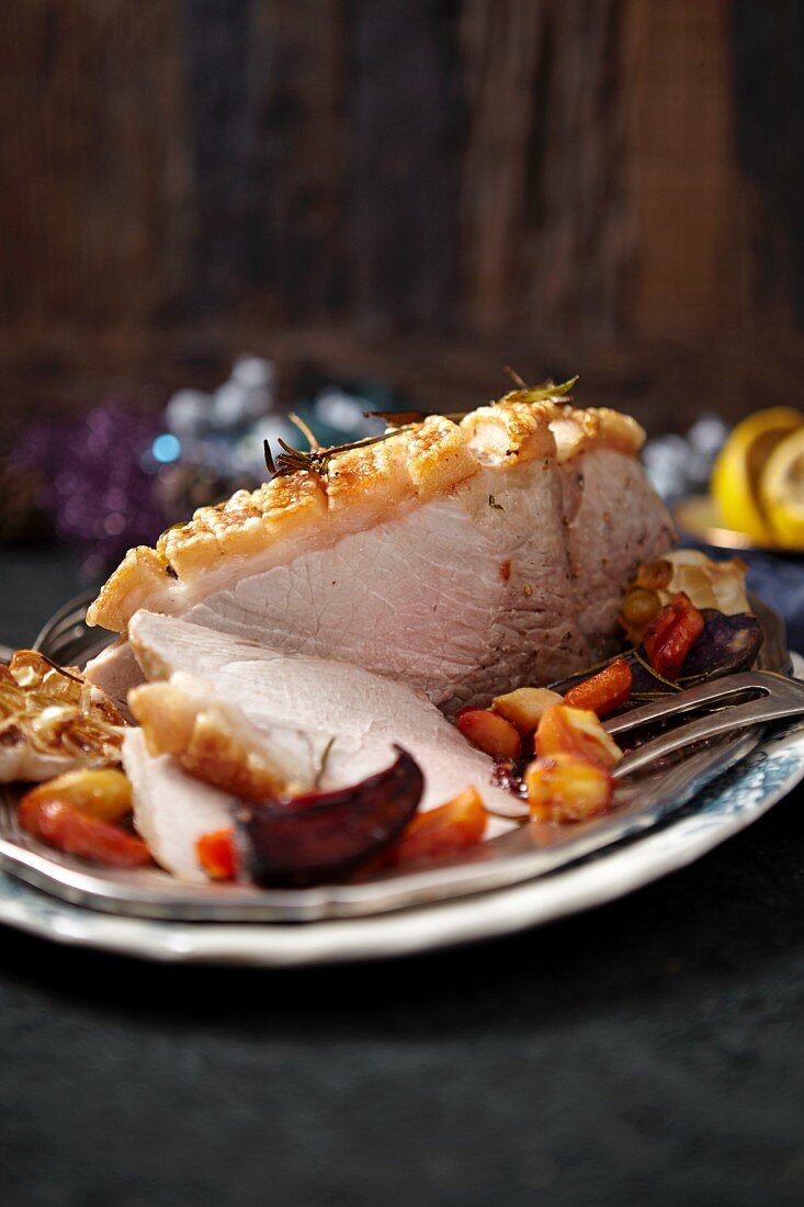 Pork roast with crackling, with root vegetables