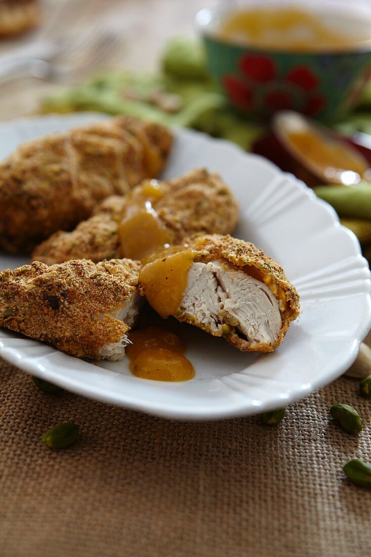 Chicken breast with a pistachio crust and apricot sauce