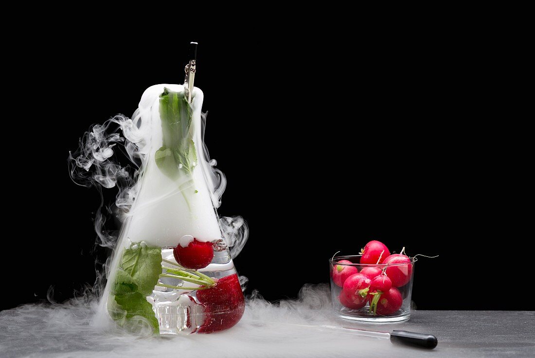 Radishes in a chemistry flask with dry ice