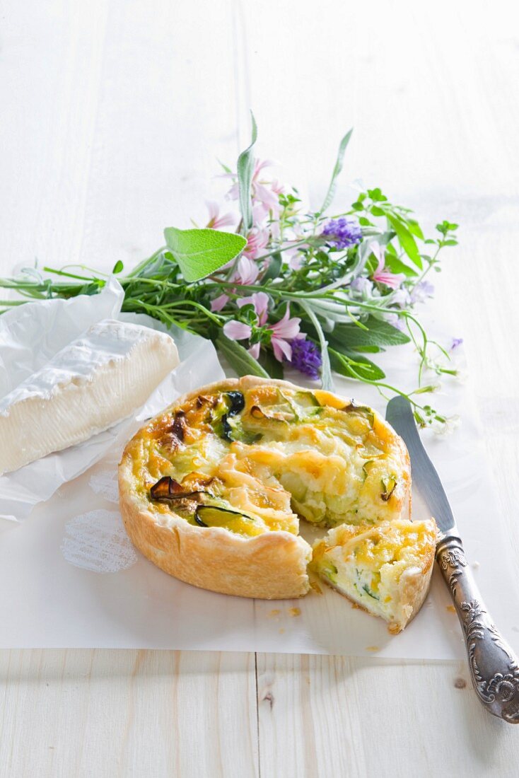 Courgette quiche, brie and a bunch of herbs