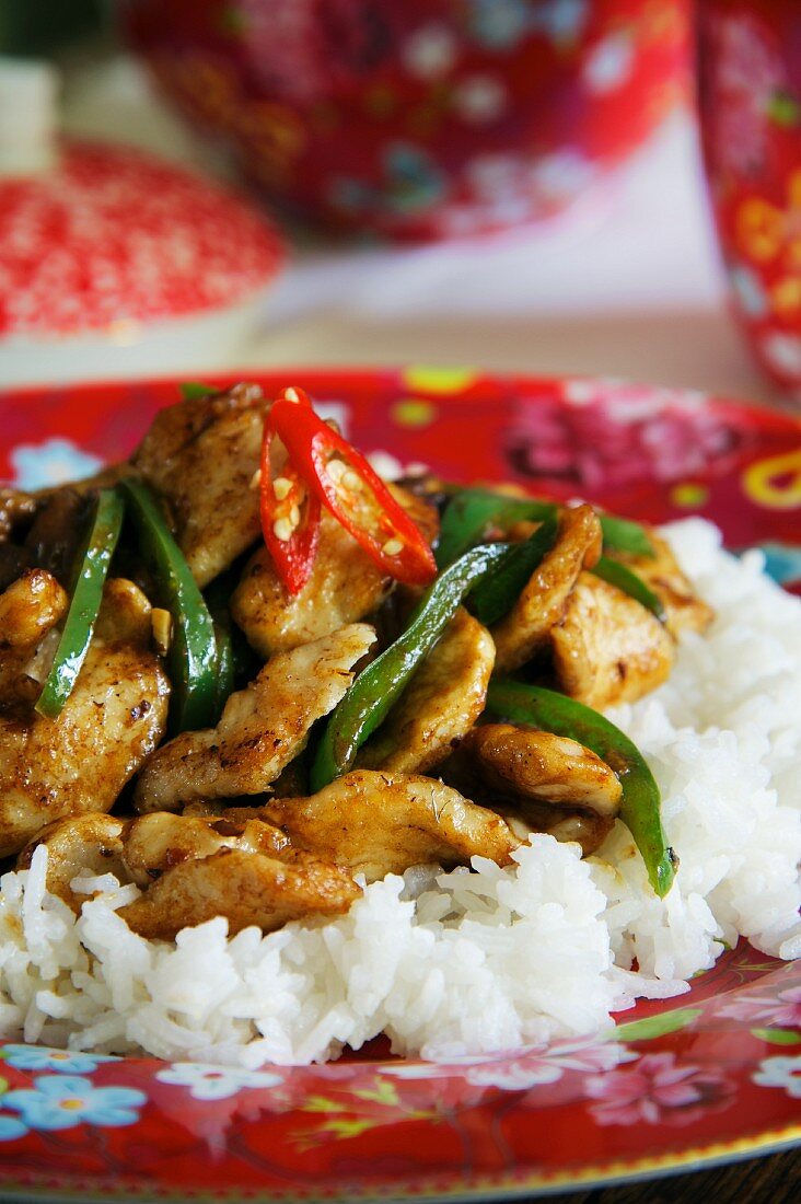 Chicken with vegetables on a bed of rice