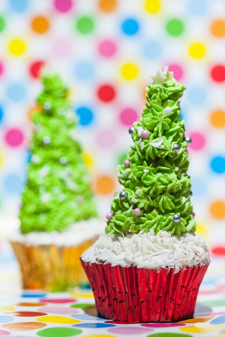 Two Christmas tree cupcakes
