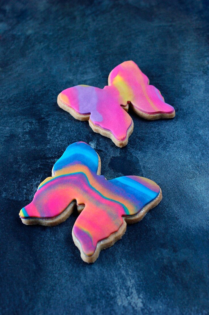 Butterfly biscuits with colourful sugar icing