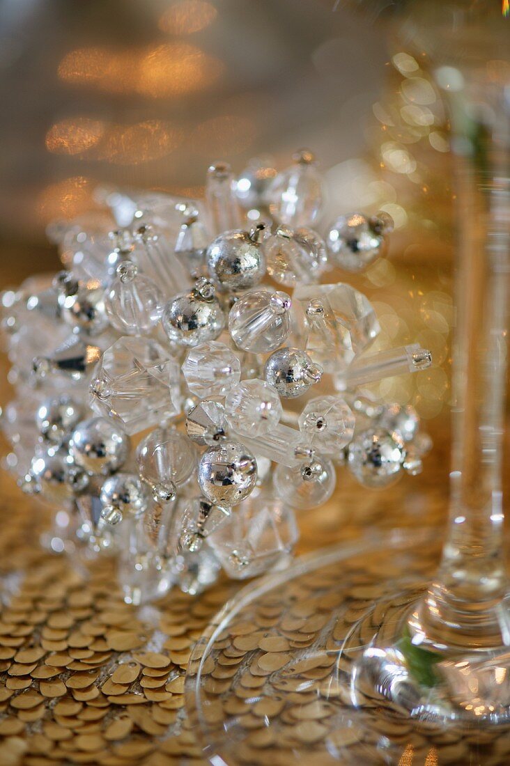 A crystal Christmas decoration on a table